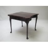 Mid C18th mahogany triple foldover tea/card table with protruding corners over a frieze drawer and