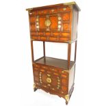 A Korean elm and brass mounted cabinet with drawers and doors, 191H