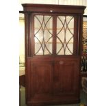 Large oak glazed corner cupboard, with 2 door below opening to reveal shelves, 211cm high