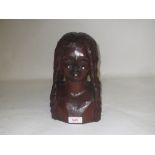 Manner of Paul Gauguin, hardwood sculpture of a maiden, her hair braided in four long tresses,