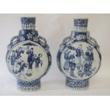 Pair of Chinese blue and white decorated moon flasks 35cm H cracks and chips