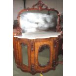 Victorian walnut mirror back chiffonier with marble top over three mirrored  doors on plinth base,