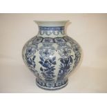 C19th Chinese porcelain shaped lobed vase with 12 foliage decorated panels, the base with twin