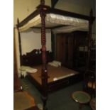 Modern four poster bed with barley twist foliate pilasters on claw and ball feet