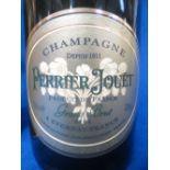 6 bottles Perrier Jouet Grand Brut each in presentation tin tubes in original cardboard box