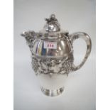 South American silver Bacchus jug with embossed vine decoration 45ozt