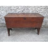 C17th/C18th planked oak coffer with fitted candle box on 'V' cut end supports 107cm W