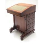 Victorian walnut davenport with rising top, four drawers to the sides with circular brass handles