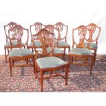Set of eight Hepplewhite style reproduction dining chairs with slip in seats