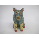 The Lucky Pig figural vase designed by Louis Wain, painted in green, yellow, red and black,