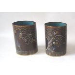 Pair of oriental cloisonné enamel brush pots, decorated birds and blossoming trees, 12cm H