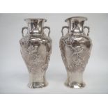 Pair Chinese silver vases with embossed floral and bird decoration 16cm high 13ozt