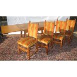 Early C20th oak draw leaf dining table and set of 4 oak dining chairs with striped upholstery,