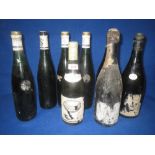 14 bottles of Pouilly Fume, "Les Loges" 1988, 2 unknown bottles 1947, 1 bottle 1920 Lanson Champagne