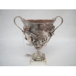 Silver plated twin handle cup with  embossed mythical scenes