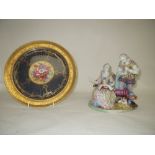 C20th Meissen figure group depicting 2 musicians in medieval dress, a dog on a cushion at their