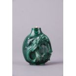 Chinese malachite snuff bottle, carved in high relief to one side with chilong and in low relief