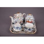 Rare C19th Chinese doucai tea service, painted with figural scenes, auspicious objects and floral,