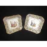 Pair of Dresden porcelain cabinet plates each painted to centre with figures in a garden, within