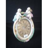 Late C19th Meissen porcelain timepiece the silvered dial with Roman numerals inscribed Howell