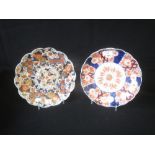 Two late C19th Japanese Imari plates, 22 cm dia