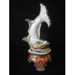 C20th Chinese porcelain Dragon head fish with pearl in mouth on shaped base, 39 cm H