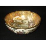 Japanese Meiji period Satsuma pottery lobed bowl decorated with figures and landscapes, black seal