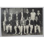 Kent 1949/50. Real photograph postcard of the Kent team, standing and seated in rows, wearing