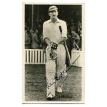 Len Hutton, Yorkshire & England. Mono real photograph postcard of Hutton walking out to bat in