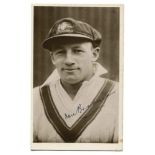 Australia 1930. Excellent plain back mono postcard of Don Bradman, head and shoulders, wearing