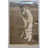 Jack Hobbs. Mono real photograph postcard of Hobbs in batting pose. Signed and inscribed by