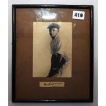 Don Bradman. Mono printed photograph of a young Bradman, half length in batting pose wearing an