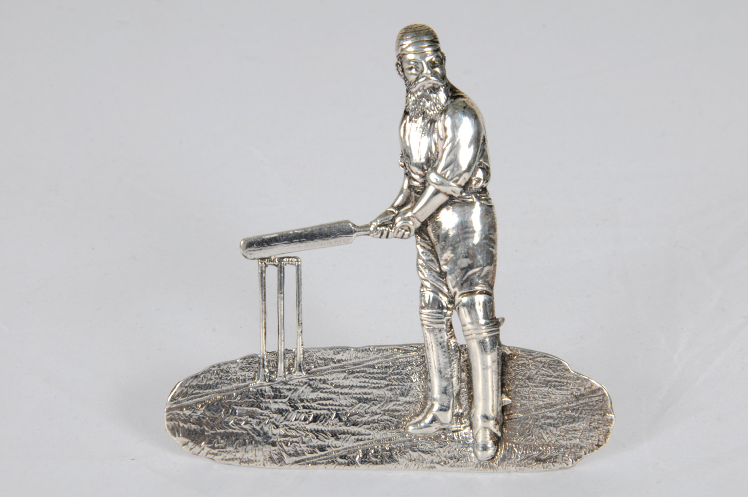 William Gilbert Grace. Excellent freestanding silver menu holder in the form of Grace standing at