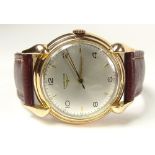 Men's Vintage Longines Swiss Made 18 Karat Yellow Gold Manual Movement Watch with Leather Strap.