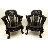 Pair 19/20th Century Deep Relief Carved Chinese Hardwood Chairs. Ornately Carved Dragon Motif with