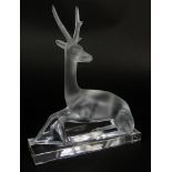Lovely Crystal Stag Figurine Features a frosted stag on clear, polished base. Signed on the