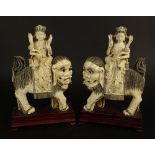 Pair of Antique Chinese Carved Ivory Guanyin Riding on Large Mythical Beasts. Inlaid With Turquoise,