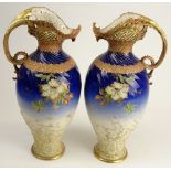 Pair of Large Teplitz Majolica Reticulated Hand Painted Pitchers. Floral Motif. Interesting Handle