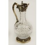 Silver Mounted Cut Crystal Covered Ewer. Hinged Top with Chased Band of Scrolls, Putti Relief