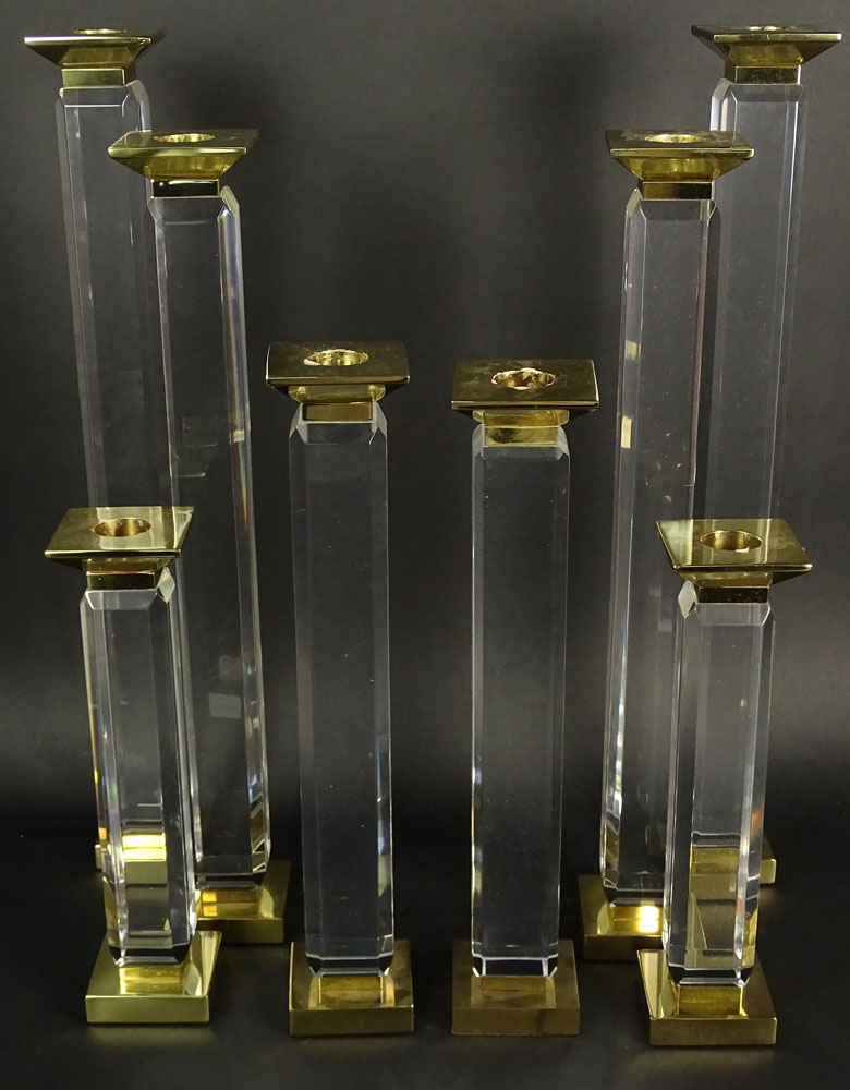 Charles Hollis Jones Eight (8) Piece Suite of Pedestal Style, Beveled Lucite and Brass Candlesticks.