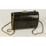 From a Palm Beach Socialite, A Chanel Black Snakeskin Clutch Evening Bag. Goldtone Chain and