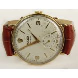 Vintage Rolex 9 Karat Yellow Gold Watch with Leather Strap. Model #12868, Serial #338453. Case