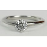 Tiffany & Co .47 Carat Diamond and Platinum Engagement Ring. Diamond F Color, SI1 Clarity. Signed.