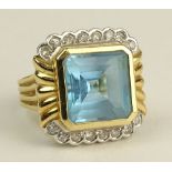 Lady's Vintage Square Cut Aquamarine, Single Cut Diamond and 18 Karat Gold Ring. Aquamarine Measures