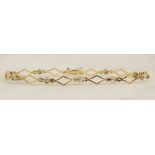 Lady's vintage 14 karat yellow gold bracelet with small accent diamonds. Unsigned. Good condition or