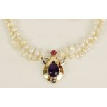Lady's vintage cabochon amethyst, cabochon pink sapphire, 14 karat yellow & white gold and baroque