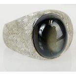 Men's vintage black star sapphire and 18 karat white gold ring. Sapphire measures 12mm x 10mm.