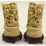 Pair Chinese Carved Ivory Foo Dogs on Hardwood Stands. Inset Coral Eyes. Deep Relief Carving.
