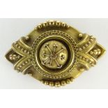 Victorian period 10 Karat yellow gold brooch. Unsigned. Good condition. Measures 2" x 1-1/4" and