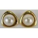 Vintage 14 Karat Yellow Gold and Mabe Pearl Earrings. Signed 14K. Good condition. Pearls measure